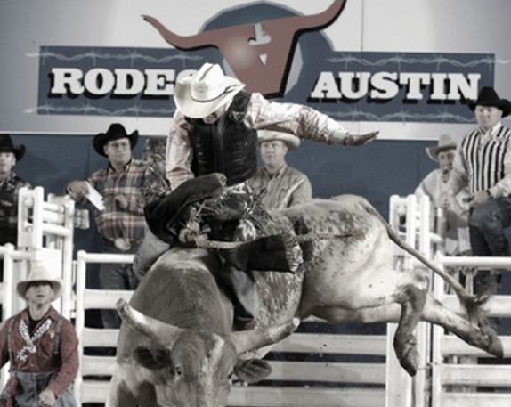Rodeo Austin bull rider on bucking bull