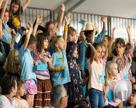 young fans cheering in arena