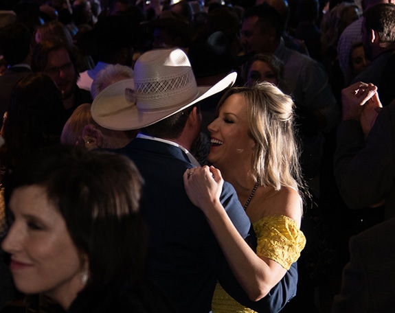Woman and man dancing at Rodeo Austin Gala 2020